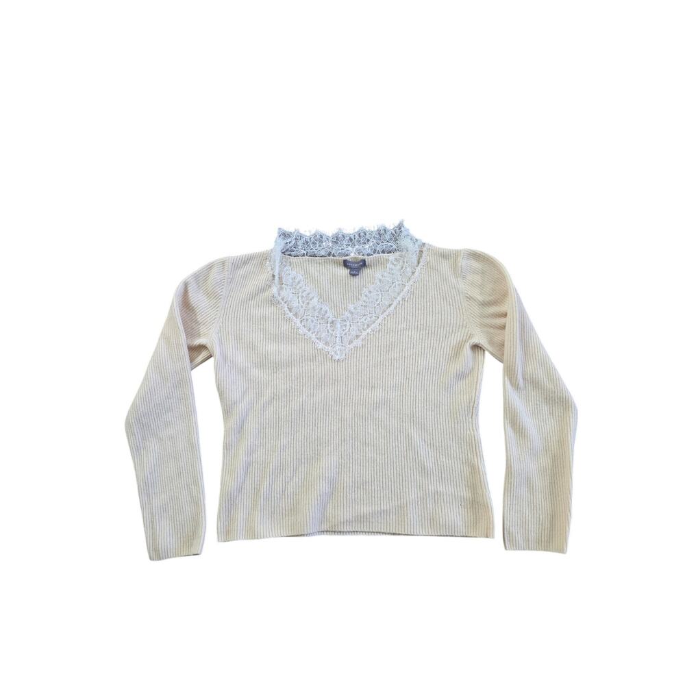 Pale yellow knit top with embellished lace trim